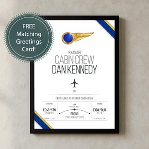 Op de afbeelding: Een ingelijste print met een Ryanair Cabin Crew-ontwerp, met de naam Dan Kennedy. De print bevat een goud en blauw embleem, een vliegtuigafbeelding en vluchtgegevens. De tekst "FREE Matching Greetings Card!" is ook aanwezig.