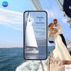 May include: A smartphone displays a wedding invitation with a nautical theme. The invitation reads "Hayley & Matthew are getting married" with the date October 22, 2022. A sailboat is visible in the background, with a couple embracing on a yacht.