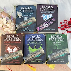 May include: A collection of six hardcover books with matching bookmarks. The book covers are in various colors, including blue, purple, brown, and green, with the title "James Potter" and the series title. Each bookmark has the series title.