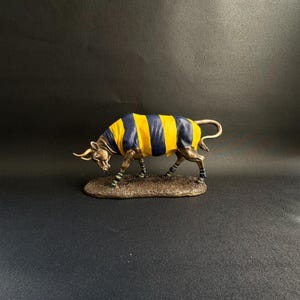Handcrafted Bronze Finish Bull Sculpture with Yellow and Blue Striped Detailing