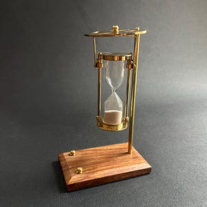 Vintage Brass Hourglass Timer with Rotating Mechanism and Solid Wood Base