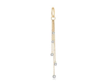 May include: A gold chain charm with a dangling chain and four small clear stones.