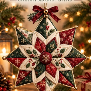 May include: A quilted star-shaped Christmas ornament featuring red, green, and cream fabric panels with gold snowflake, holly, and berry prints. The ornament is topped with a dark red ribbon bow and gold beads, with gold metal accents at each point.