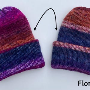 May include: Two hand-knitted beanies with a folded brim. The hats feature a color gradient from dark purple to orange and brown. The word "Florist" is printed in white at the bottom of the image.