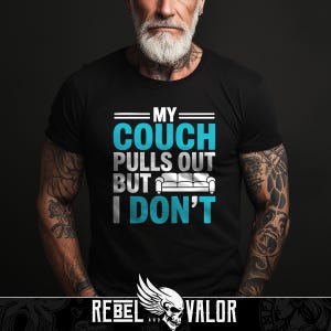 May include: Black t-shirt with the text "MY COUCH PULLS OUT BUT I DON'T" in white and teal. A graphic of a couch is between the words "BUT" and "I". The Rebel and Valor logo is at the bottom.