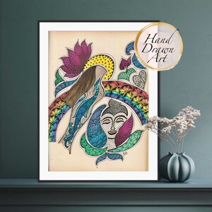 May include: A hand-drawn illustration of a colorful rainbow, a bird, and a Buddha face. The artwork is framed and features intricate details in a variety of colors, including pink, blue, green, yellow, and orange.