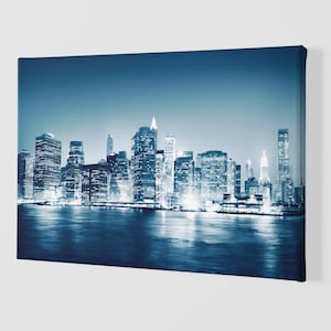 A View Of New York City At Night Time Canvas Art Print