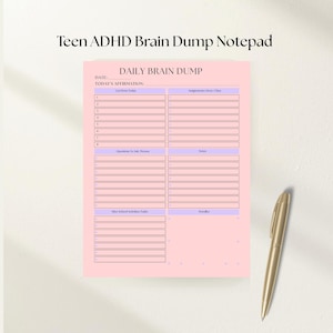 May include: A pink notepad with the text "Teen ADHD Brain Dump Notepad" at the top. The notepad has sections for daily tasks, affirmations, assignments, notes, and doodles. A gold pen rests on the right side of the notepad.