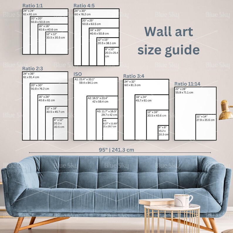 May include: A wall art size guide with different aspect ratios, including 1:1, 2:3, 4:5, 3:4, and 11:14. The guide shows the dimensions in inches and centimeters for each ratio, with examples of common sizes for each. The guide is displayed on a white background with a blue couch in the foreground.