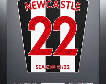 Rama z autografem zespołu Newcastle United Machine