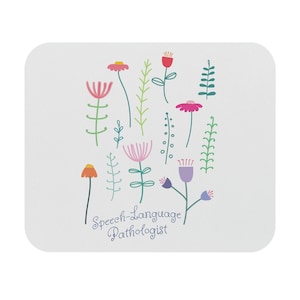 May include: A white background with a colorful illustration of flowers and the text "Speech-Language Pathologist".
