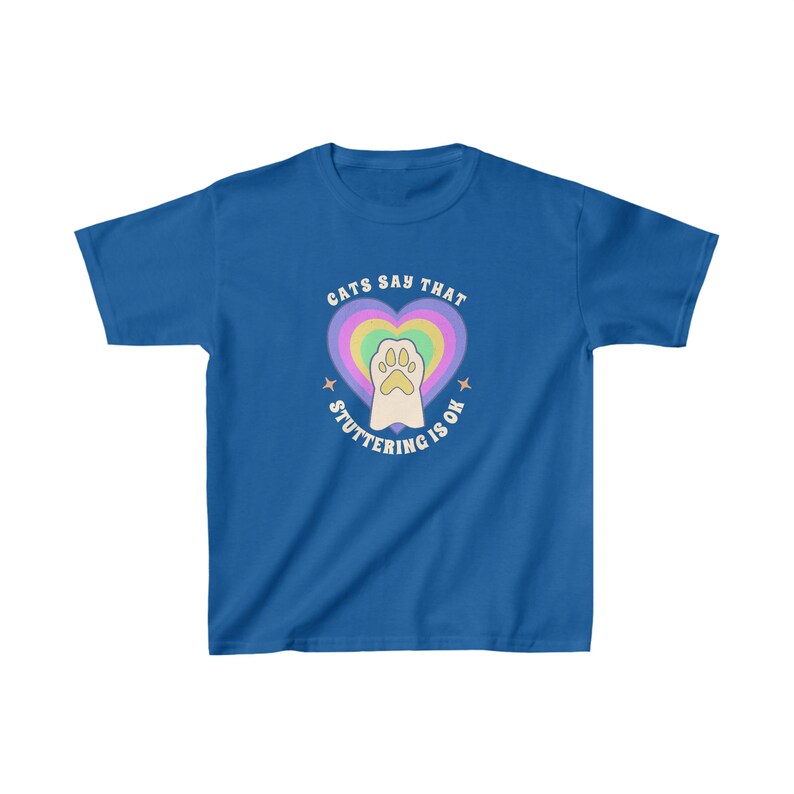 May include: A royal blue youth t-shirt with a rainbow heart and a paw print inside. The text "Cats say that stuttering is ok" is written around the heart.