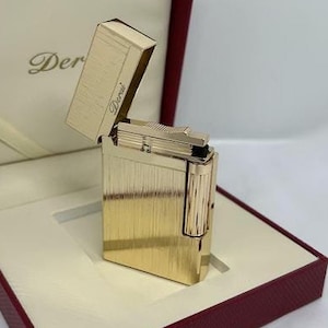 Amazing Gold plated Collectable Vintage gas lighter soft flame old school in a box