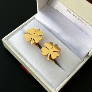 A premium set of gold plated cuff links four-leaf clover in a premium box