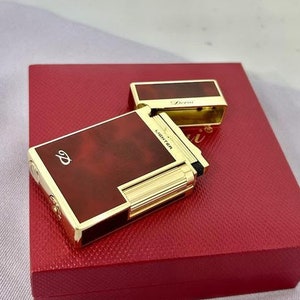 Amazing Gold plated Collectable Vintage gas lighter soft flame old school in a box
