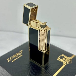 Incredibile accendino a cherosene vintage da collezione color oro - nero, vecchia scuola, retrò, in una scatola