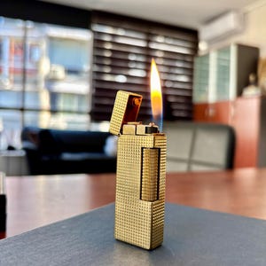 Vintage Gold-Plated Dunhill Rollergas Lighter – Timeless Elegance, Precision Ignition  Luxury Craftsmanship for Collectors & Connoisseurs