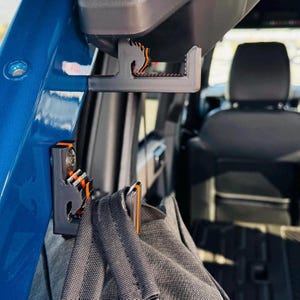 2021+ Black ABS Plastic Utility Hooks W/Colored Stripe For Ford Bronco