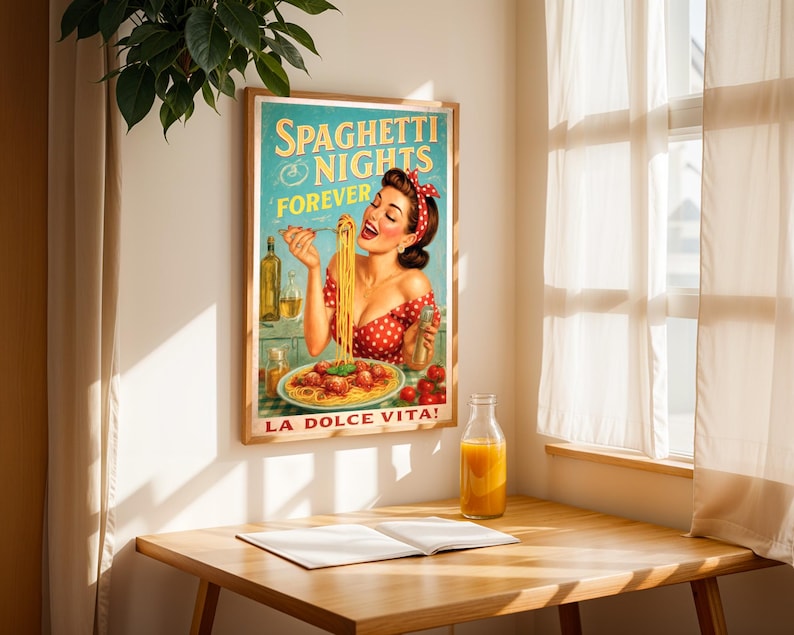May include: A framed vintage-style poster with the text "Spaghetti Nights Forever" and "La Dolce Vita!" features a woman enjoying spaghetti. The poster has a wooden frame and is displayed on a wooden table with a glass bottle of orange juice.