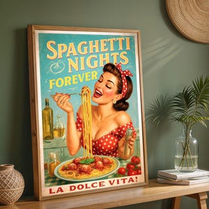 May include: A framed vintage-style poster with the words "Spaghetti Nights Forever" and "La Dolce Vita!" A woman in a red polka-dot dress is eating spaghetti. The poster has a wooden frame and is displayed on a wooden table.