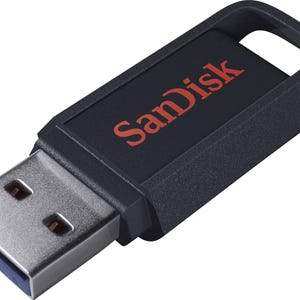 May include: Black USB flash drive with the red "SanDisk" logo. The drive has a silver USB connector and a loop for attaching to a keychain. The design is sleek and modern, suitable for data storage and transfer.