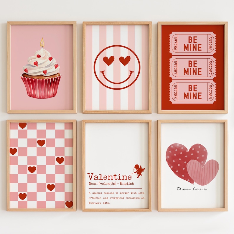 May include: Set of six Valentine's Day themed printable wall art prints. The prints feature a pink and red color scheme with hearts, a cupcake, a smiley face, a checkered pattern, a definition of the word "Valentine", and a heart with the text "true love".