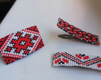 Designer jewelry. A hair tie and two click-click hair clips in the Ukrainian style.