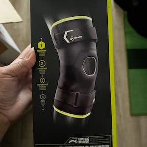 May include: Black and yellow Donjoy Performance Bionic Comfort Hinged Knee brace with a terry lining for comfort. Bilateral hinged knee wrap for joint stabilization. Recommended for: Medial/Lateral Ligament Protection, Knee Instability, Sprains and Strains, Hyperextension, Meniscus Injuries.