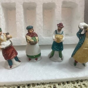 Heritage Village for Department 56 porcelain Christmas figurines baker series