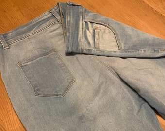 Slim Fit Blue Distressed Jeans: Sculpting Stretchy Denim