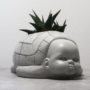 Turtle Baby - The Original Fugly planter.  Concrete | Funny | creepy |  ugly | Doll | bizarre | Head | weird | Desk pot | Horror | gothic