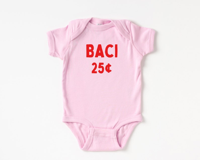 May include: A pink baby onesie with the words "BACI 25&cent;" printed in red.