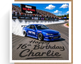 May include: A square greeting card featuring a blue drift car on a racetrack with thick white tire smoke. A large digital scoreboard in the background displays "Happy 16th Birthday Charlie". The text "Happy 16th Birthday Charlie" is also printed on the asphalt.