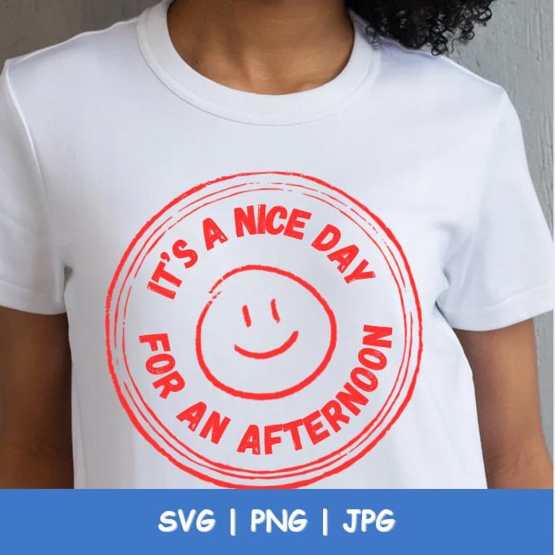 May include: White t-shirt with a red circular graphic that reads "It's a nice day for an afternoon" around a smiling face. The bottom of the image shows the text "SVG | PNG | JPG".