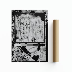 May include: Black and white abstract art print with a geometric design. The print features a central square with a textured pattern and a smaller square with a grey, white, and black colour scheme.