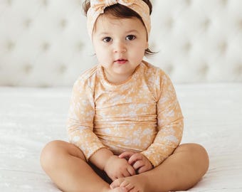 Organic Bamboo Baby Bodysuit – Golden Floral, Scalloped Edge