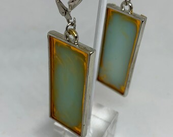Blue and Orange swirl resin, one-of-a-kind earrings with gold frames and lever back ear loops