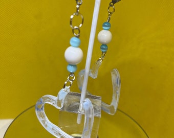 Sky blue and white resin with bead earrings.