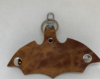 Batman real leather wrap keychain.  Each is one of a kind and hand made from sustained leather