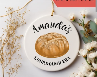 May include: White ceramic ornament with a brown sourdough bread illustration and the text "Amanda's Sourdough Era".