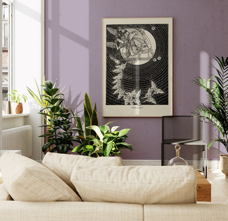 May include: A black and white illustration of a woman playing a harp in a cage surrounded by vines. The illustration is framed and hanging on a light purple wall.