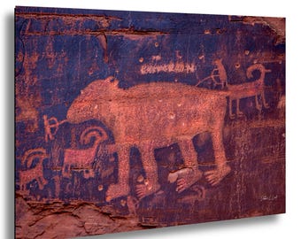 Bear Petroglyph print, Canyonland National Park, red rock