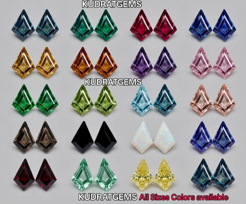 May include: A collection of kite-shaped faceted gemstones arranged in pairs, featuring a wide variety of colors including blue, green, red, yellow, purple, pink, black, and white. The text KUDRATGEMS is visible at the top and bottom.