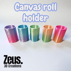 May include: Five gradient-coloured canvas roll holders in pink, blue, green, and orange. Each holder has a curved design and the text "Zeus 3D Creations" printed on the side. The words "Canvas roll holder" are written in a light blue font.