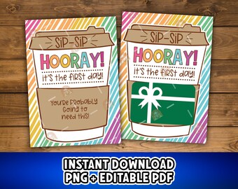 May include: Two coffee cup-shaped cards with the text "SIP-SIP HOORAY! it's the first day!". One card has the text "You're Probably Going to Need This!" and the other has a green gift card. The background is a rainbow striped pattern.