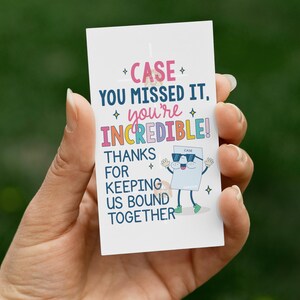 May include: A white card held in a hand with the text "CASE YOU MISSED IT, you're INCREDIBLE!" in colorful letters. A cartoon document character with sunglasses is also featured. The card reads "THANKS FOR KEEPING US BOUND TOGETHER."