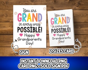 Puede incluir: Dos tarjetas blancas con texto sobre un fondo de madera. Las tarjetas dicen "You are GRAND in every way POSSIBLE! Happy Grandparents Day!" en letras coloridas. Una tarjeta es un letrero, la otra es una tarjeta.