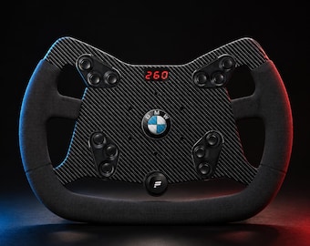 May include: A black carbon fiber racing steering wheel featuring a central BMW logo, a digital display showing the number 260, multiple black circular buttons, and dark gray suede grips on the sides, set against a dark background.