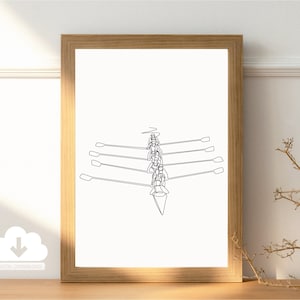 Puede incluir: Una impresión enmarcada con un dibujo lineal minimalista de un equipo de remo. La obra de arte, en negro sobre blanco, muestra a cinco remeros en una barca con remos. La impresión está en un marco de madera, ideal para la decoración.