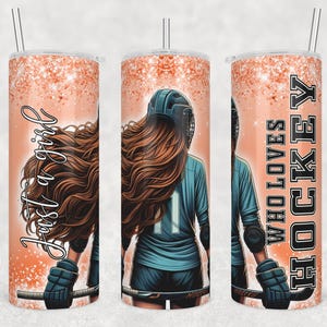 May include: A stainless steel tumbler with a pink glitter background and a graphic of a woman playing hockey. The text "Just a girl who loves hockey" is printed on the tumbler.
